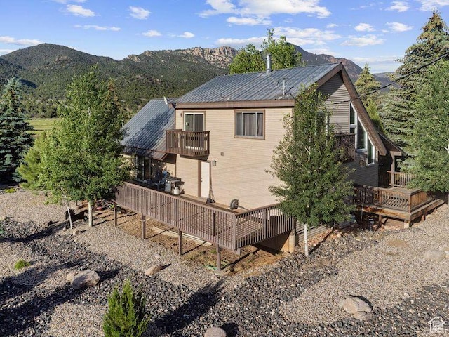10 S 900 E, Pine Valley, UT 84781 - view of side of property featuring a deck with mountain view, a metal roof, and a balcony