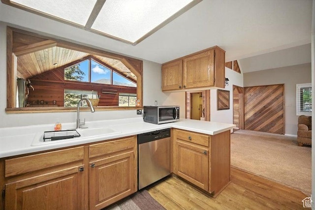 10 S 900 E, Pine Valley, UT 84781 - kitchen featuring stainless steel appliances, lofted ceiling, a peninsula, healthy amount of natural light, and light countertops