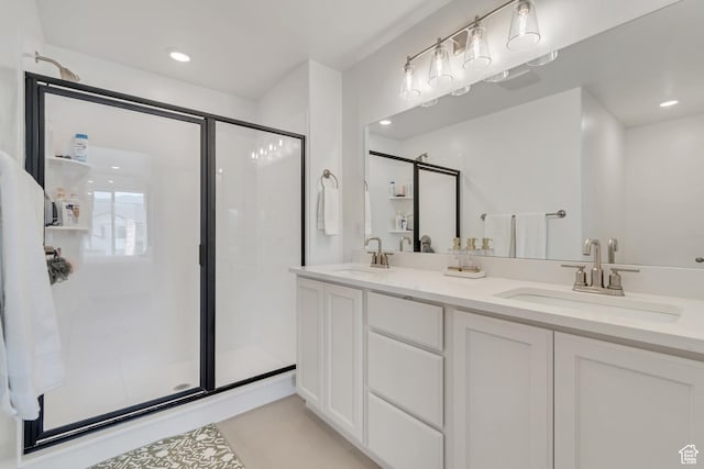 169 E Volunteer Dr, Spanish Fork, UT 84660 - bathroom featuring a shower stall, double vanity, and tile patterned flooring
