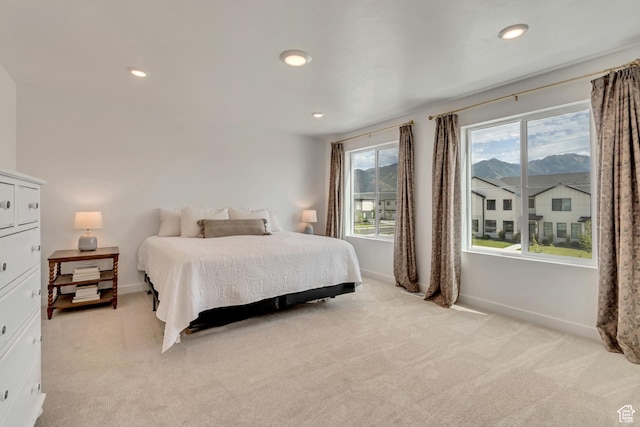 169 E Volunteer Dr, Spanish Fork, UT 84660 - bedroom featuring light carpet, multiple windows, and recessed lighting