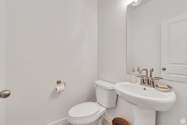 169 E Volunteer Dr, Spanish Fork, UT 84660 - bathroom with baseboards and toilet