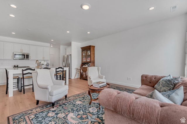 169 E Volunteer Dr, Spanish Fork, UT 84660 - living room with recessed lighting and light wood-style floors