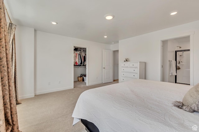 169 E Volunteer Dr, Spanish Fork, UT 84660 - bedroom with light colored carpet, recessed lighting, and a walk in closet
