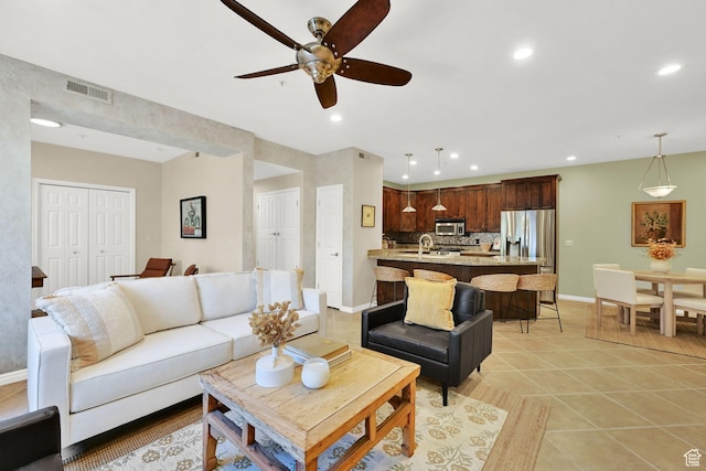 4988 S Timber Way E Unit 206, Millcreek, UT 84117 - living room featuring a ceiling fan, recessed lighting, and light tile patterned floors