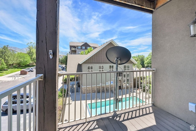 4988 S Timber Way E Unit 206, Millcreek, UT 84117 - deck featuring a community pool