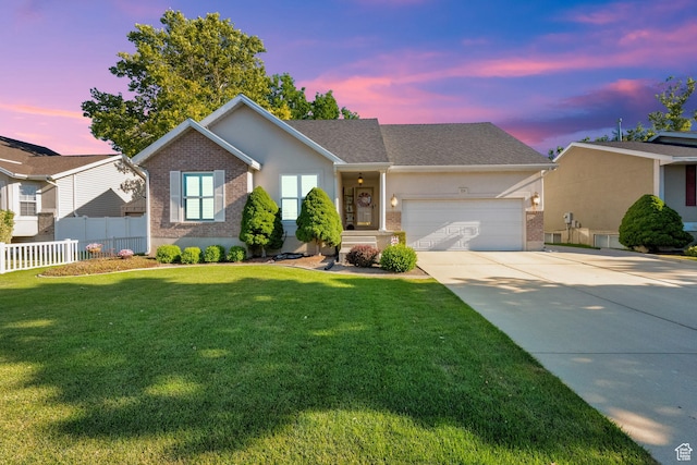 224 Rawlins Ln, Draper, UT 84020 - single story home with brick siding, a garage, driveway, and stucco siding