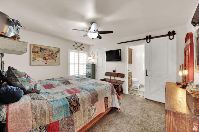 224 Rawlins Ln, Draper, UT 84020 - carpeted bedroom with a barn door, ensuite bathroom, and a ceiling fan