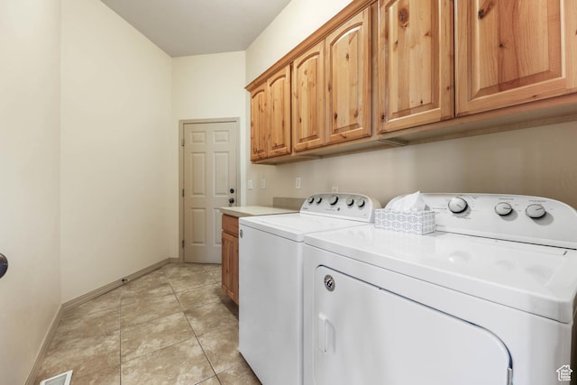 1524 W Foliage Ln, South Jordan, UT 84095 - washroom featuring cabinet space, washing machine and dryer, and light tile patterned floors