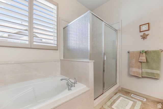 1524 W Foliage Ln, South Jordan, UT 84095 - bathroom featuring a shower stall, a garden tub, and tile patterned floors