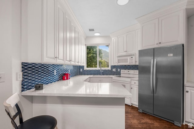 9566 N 4500 W, Cedar Hills, UT 84062 - kitchen featuring white appliances, a peninsula, and white cabinetry