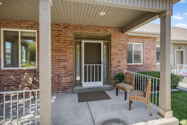 9566 N 4500 W, Cedar Hills, UT 84062 - entrance to property with brick siding and a porch