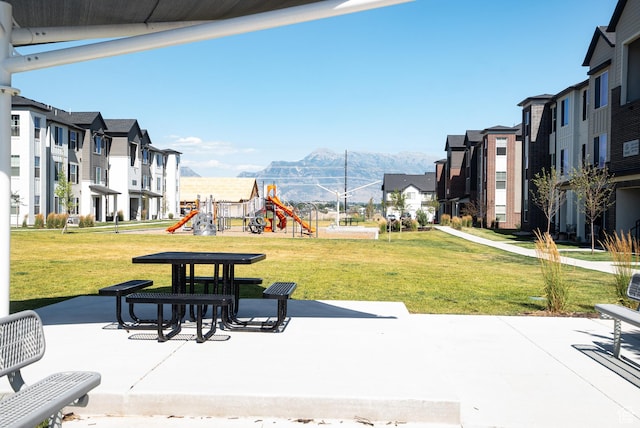 3722 W 1440 N Unit F202, Lehi, UT 84043 - view of home's community featuring a lawn, a mountain view, a patio, and a residential view