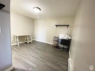 3462 Heyward Ct, Eagle Mountain, UT 84043 - home office featuring wood finished floors and baseboards