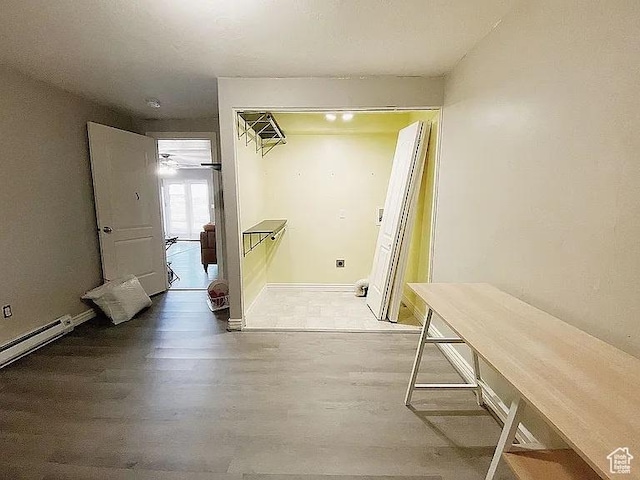 3462 Heyward Ct, Eagle Mountain, UT 84043 - basement with wood finished floors and baseboard heating