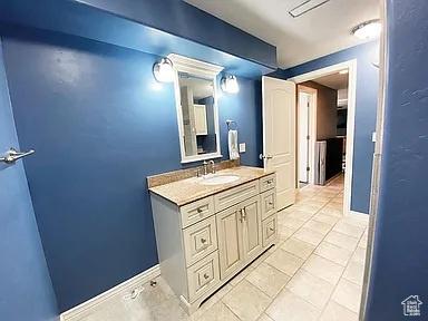 3462 Heyward Ct, Eagle Mountain, UT 84043 - bathroom featuring vanity and tile patterned flooring