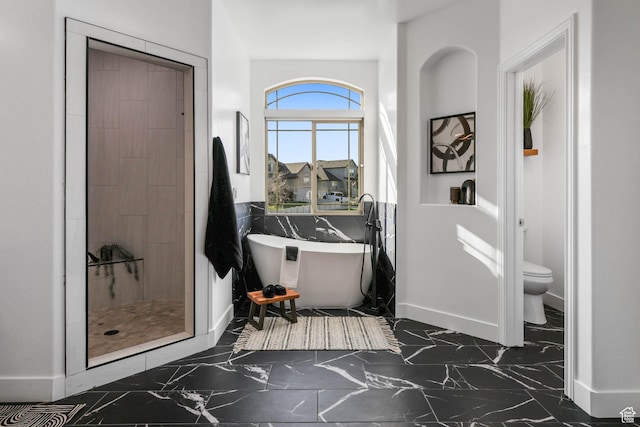1692 N Sage Ln, Saratoga Springs, UT 84045 - bathroom featuring a freestanding bath, marble finish flooring, and a stall shower