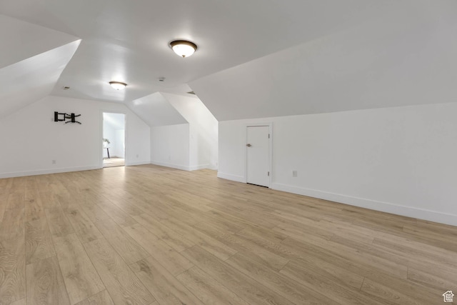 1692 N Sage Ln, Saratoga Springs, UT 84045 - additional living space with light wood-type flooring and vaulted ceiling