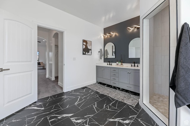 1692 N Sage Ln, Saratoga Springs, UT 84045 - full bathroom with marble finish flooring, double vanity, and a tile shower
