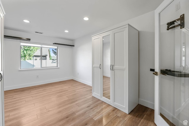 1692 N Sage Ln, Saratoga Springs, UT 84045 - unfurnished bedroom featuring light wood-style floors and recessed lighting