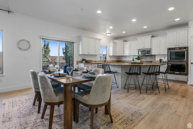 1692 N Sage Ln, Saratoga Springs, UT 84045 - dining space with recessed lighting and light wood-style floors