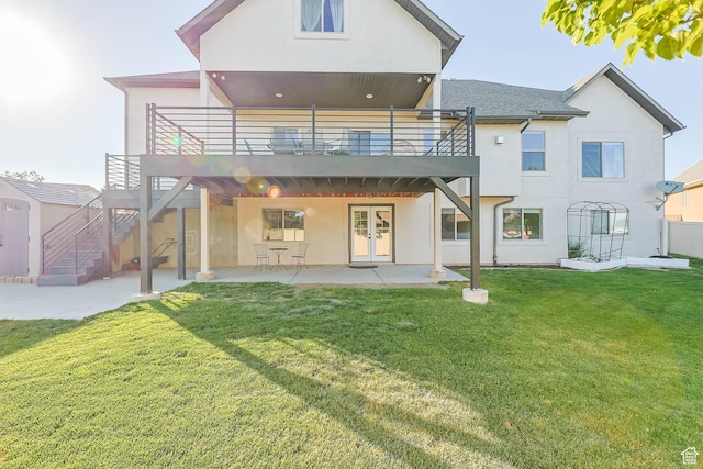 1692 N Sage Ln, Saratoga Springs, UT 84045 - back of house with french doors, a patio, stucco siding, and a yard