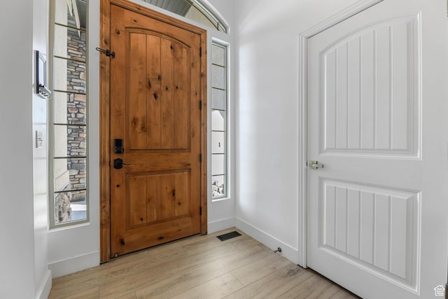 1692 N Sage Ln, Saratoga Springs, UT 84045 - entryway with healthy amount of natural light and light wood-type flooring