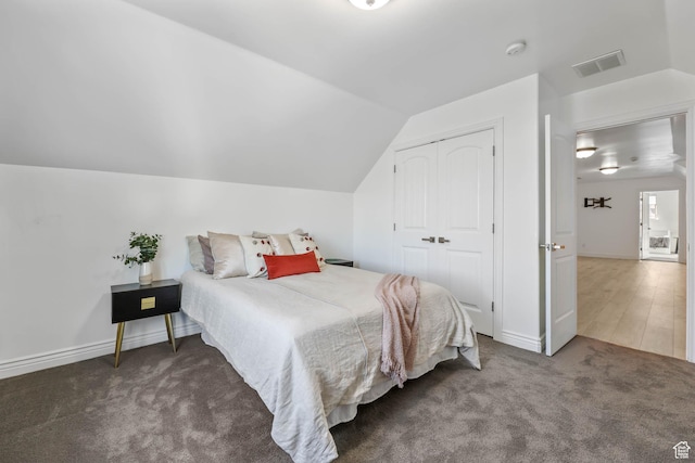 1692 N Sage Ln, Saratoga Springs, UT 84045 - bedroom with vaulted ceiling, carpet, and a closet