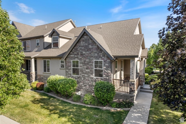 5549 W Parkway W Dr, Highland, UT 84003 - view of front facade with stone siding, stucco siding, a front lawn, a shingled roof, and a porch