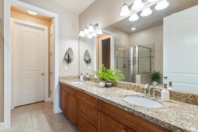 5549 W Parkway W Dr, Highland, UT 84003 - bathroom featuring double vanity, a shower stall, and tile patterned floors
