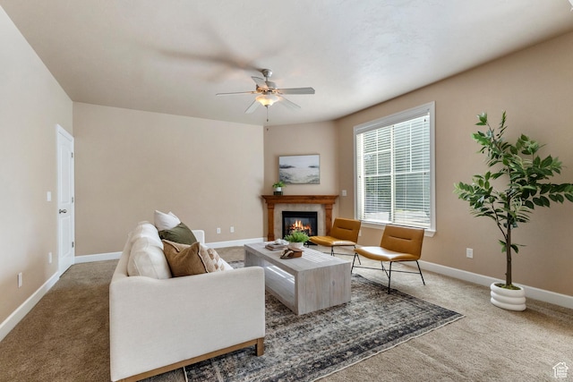 5549 W Parkway W Dr, Highland, UT 84003 - living area featuring a glass covered fireplace, a ceiling fan, and carpet flooring