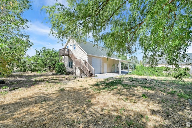 3112 N Pelican Dr, Farr West, UT 84404 - view of side of home with stairs and a patio area