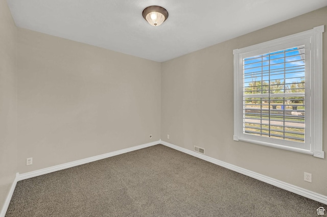 3112 N Pelican Dr, Farr West, UT 84404 - carpeted spare room featuring baseboards