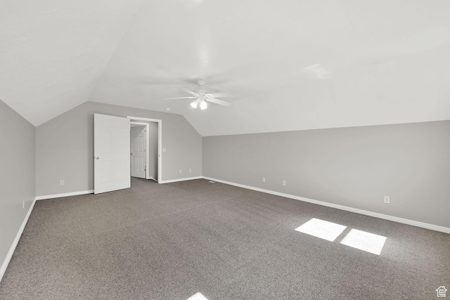 3112 N Pelican Dr, Farr West, UT 84404 - additional living space featuring vaulted ceiling, dark colored carpet, and ceiling fan
