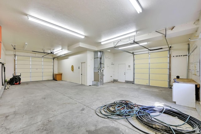 3112 N Pelican Dr, Farr West, UT 84404 - garage featuring heating unit and a garage door opener