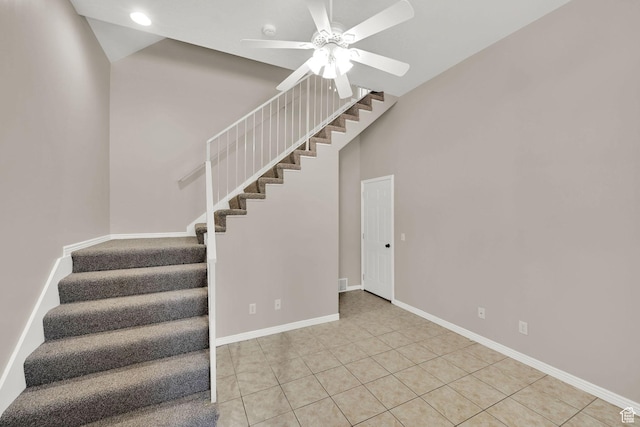 3112 N Pelican Dr, Farr West, UT 84404 - stairway featuring a ceiling fan and tile patterned flooring