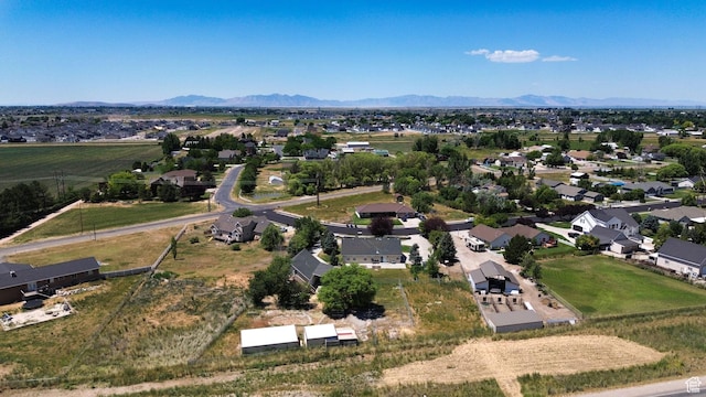 3112 N Pelican Dr, Farr West, UT 84404 - aerial view of residential area with a mountainous background