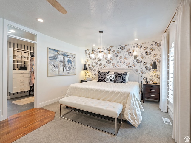 2677 N 700 E, Provo, UT 84604 - bedroom featuring carpet flooring, a walk in closet, and recessed lighting