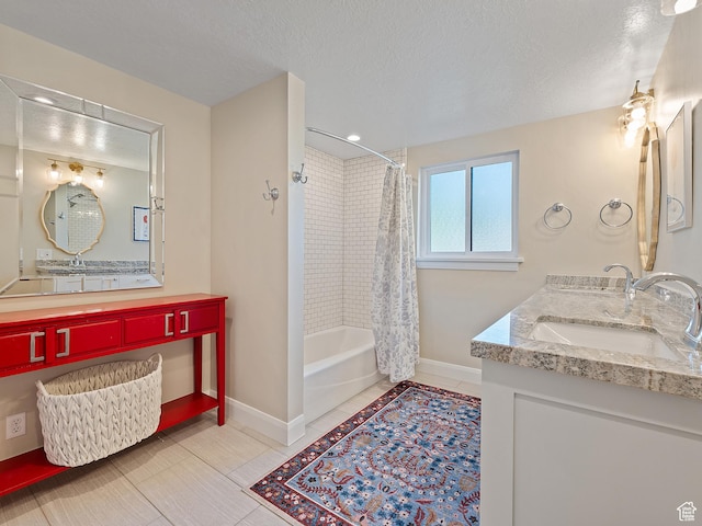 2677 N 700 E, Provo, UT 84604 - full bathroom featuring shower / tub combo, double vanity, and a textured ceiling