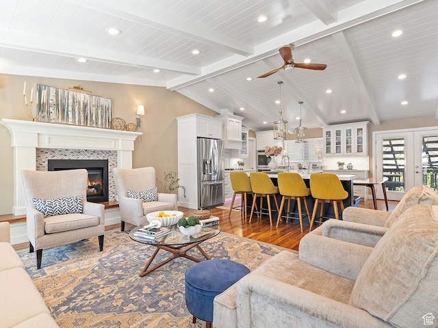 2677 N 700 E, Provo, UT 84604 - living room featuring wood finished floors, a tile fireplace, ceiling fan, recessed lighting, and wooden ceiling