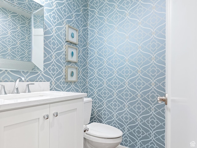2677 N 700 E, Provo, UT 84604 - half bathroom featuring wallpapered walls and vanity