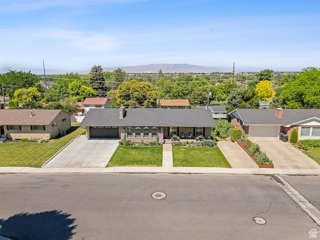 2677 N 700 E, Provo, UT 84604 - view of front of property with driveway, an attached garage, and a front yard