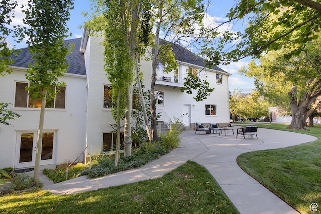 6373 W 10500 N, Highland, UT 84003 - view of home's community with a lawn and a patio area