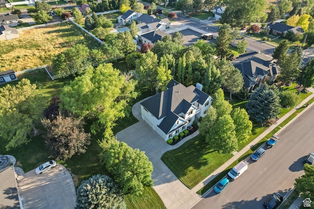 6373 W 10500 N, Highland, UT 84003 - aerial view of property and surrounding area featuring a tree filled landscape and nearby suburban area