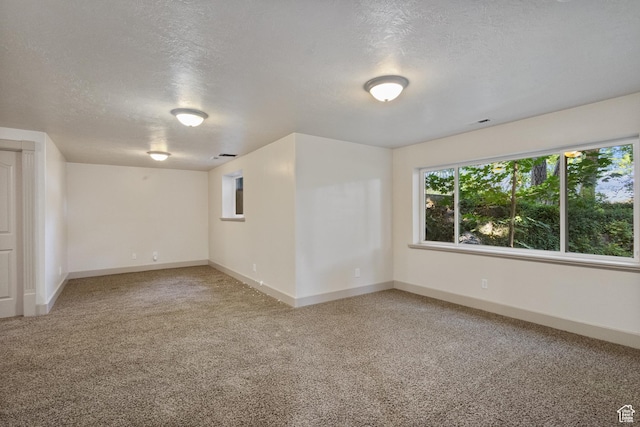 6373 W 10500 N, Highland, UT 84003 - unfurnished room featuring light carpet and a textured ceiling