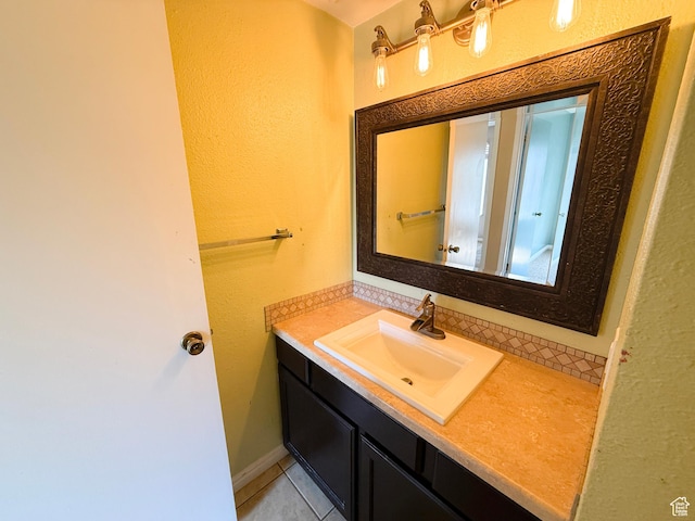165 E 100 N Unit F, Logan, UT 84321 - bathroom with vanity and tile patterned floors