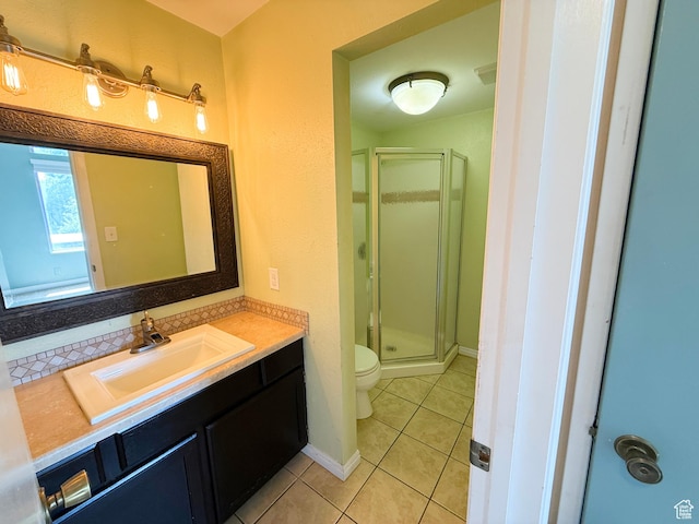 165 E 100 N Unit F, Logan, UT 84321 - full bath featuring a stall shower, vanity, and tile patterned floors