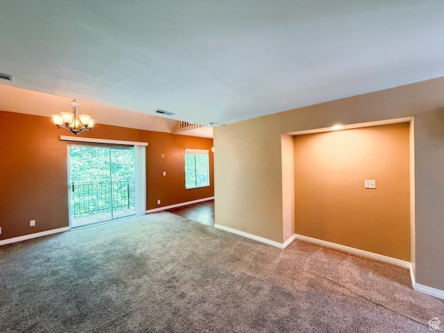 165 E 100 N Unit F, Logan, UT 84321 - carpeted empty room with a chandelier and baseboards