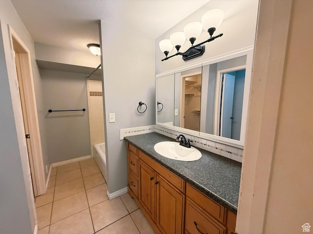 165 E 100 N Unit F, Logan, UT 84321 - bathroom with vanity, tile patterned flooring, and bathing tub / shower combination