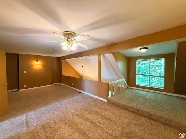 165 E 100 N Unit F, Logan, UT 84321 - unfurnished living room with a ceiling fan and carpet floors