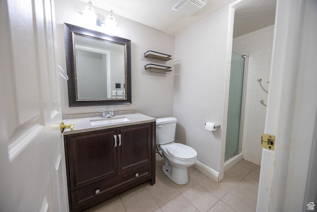 240 E 400 N Unit 28, Logan, UT 84321 - full bathroom featuring a shower stall, vanity, and tile patterned floors